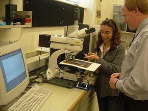 Figure 2. Lucia Burgio and Richard Hark analysing The Nativity (E.949-2003) by Raman microscopy (Photography by Richard Hark) 