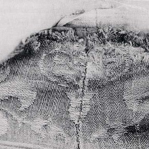 Detail before conservation showing damage to the back of neck.