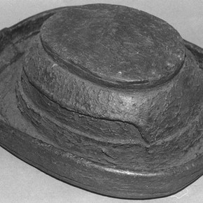 Figure 1. 19th century 'Cuir Bouilli' dockworker's hat. Museum of London no. MOL. 80.431. Photography by Laura Davies. Image reproduced with permission from the Museum of London.