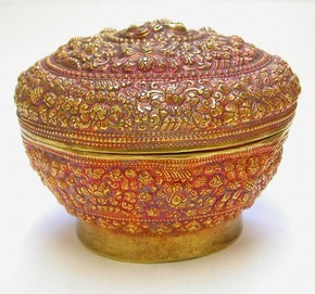 Example of the use of tamarind pulp to create a tint on the surface of gold repoussé work [Museum no. IM.49-1937]