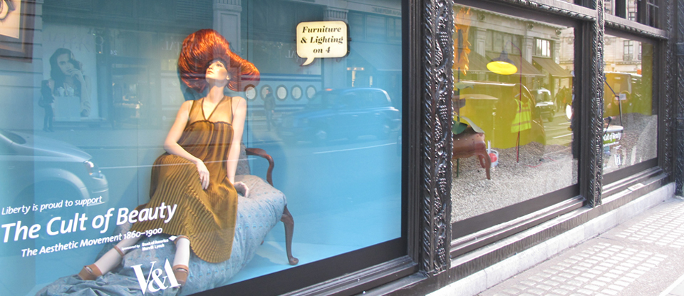 Front window of Liberty, London showing corporate sponsorship for The Cult of Beauty exhibition