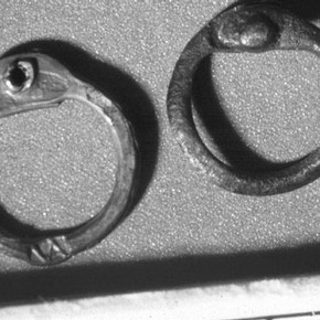 Figure 2a. Left a new riveted link stamped VA. Right an original link. Photography by S. Metcalf V