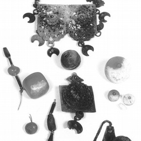 Figure 4. Badly degraded cellulose nitrate and metal necklace. Photography by V