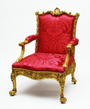 Gilded and upholstered armchair, 18th century, designed by Robert Adam and made by Thomas Chippendale. Museum no. W.1-1937