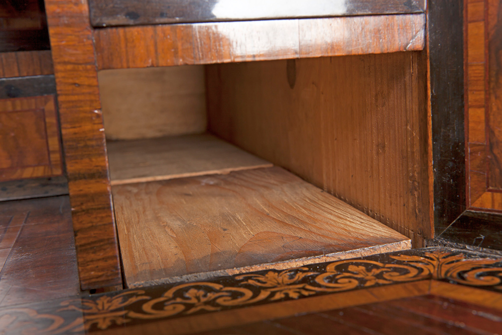 Writing cabinet: detail showing base of lower right-hand drawer
