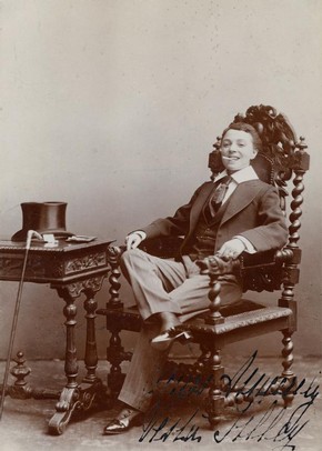 Victorian era performer in men's clothing