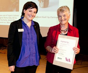 Clarissa Dorner receiving the Ceramics Award from curator Melanie Vandenbrouck-Przbylski