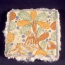 Glazed earthenware tile, Mexico. Salts are <br/>visible as long white needles around the unglazed edges