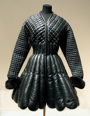 Coat and belt, Autumn-Winter 1992/93, Versace, padded and quilted black leather trimmed with fox fur and astrakhan, black leather with gilt embellishments