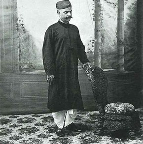 Figure 2 - Image of a 'Hindu gentleman with a prie-dieu chair' similar to the V&A’s Bombay Blackwood Chair, from the V&A Picture Library