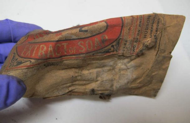 Package of Hudson's extract of soap, found inside one of the monumental casts in gallery 46 A. Image, J. Puisto © Victoria and Albert Museum, London.