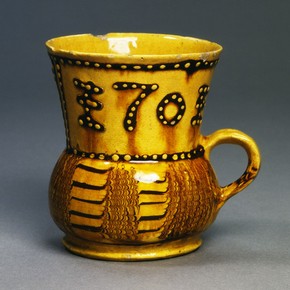 Mug, dated 1701. Probably made in Burslem, England. Museum no C.120-1938