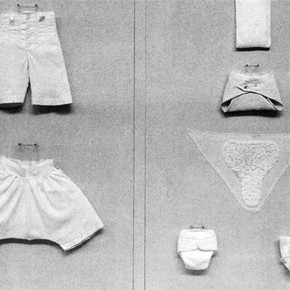 Complete display board showing nappies and girls' and boys' 19th century drawers. Photography by V