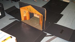 Figure 3. The model was placed onto the base of the housing, facing the front to ensure the contents could be viewed without having to open the box completely. (Photography by Merryl Huxtable)