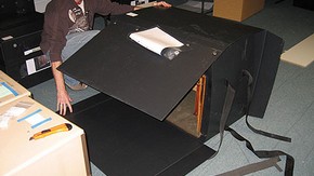 Figure 4. First the sides and then the front and back of the box were lifted into position. (Photography by Merryl Huxtable)