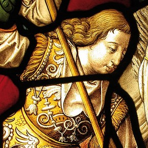 Figure 3. Before treatment (c.307-1928) detail of St Michael showing face partially covered by lead. (Photography by Ann Marsh).