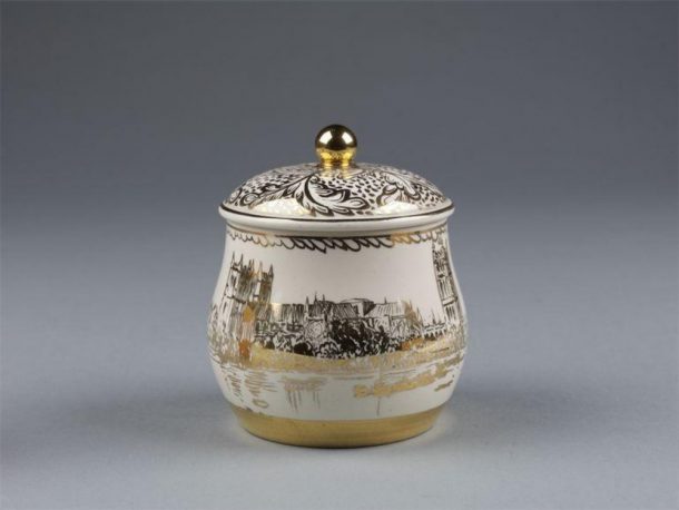 Small ornate pot showing a picture of Westminster Cathedral and the Houses of Parliament
