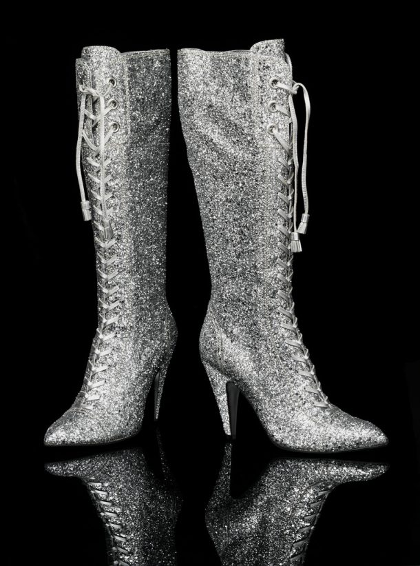 A pair of shiny sequined knee-high boots