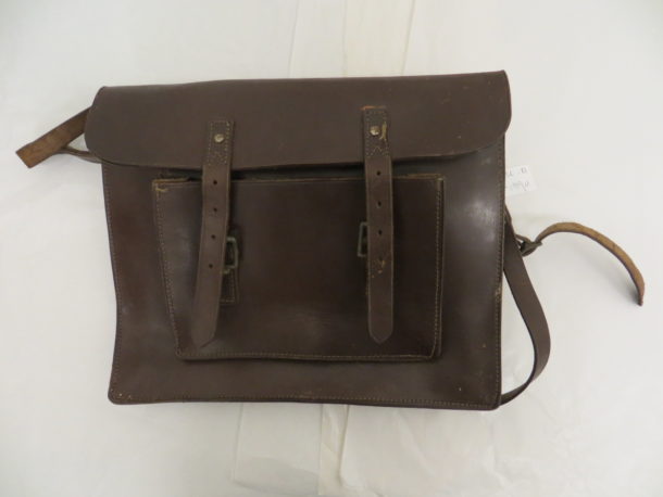 Leather school satchel with metal buckles and studs. Probably made in Britain about 1930-1939.