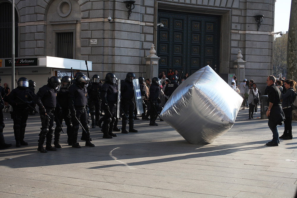 Inflatable cobblestone, action of Eclectic Electric Collective in cooperation with Enmedio collective during the General Strike in Barcelona 2012. © Oriana Eliçabe/Enmedio.info