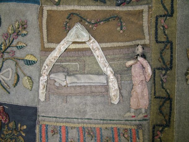 The heavily soiled Bohemian wool quilt. A man in a spotty banyan prepares to get into his silk-curtained bed © Victoria and Albert Museum, London