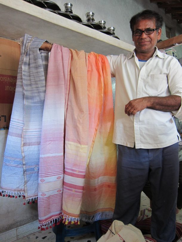 Dayalal Kudecha with a selection of his recently woven stoles. (copyright Divia Patel)