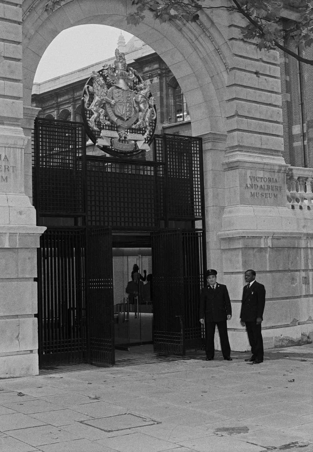 V&A security guards outside the central gate of the Aston Webb Screen, 1981. © Victoria and Albert Museum, London