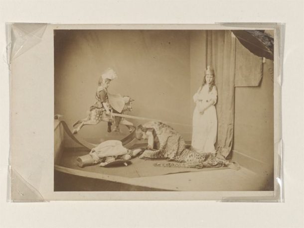 Photograph of young children acting out story of St George and the Dragon.
