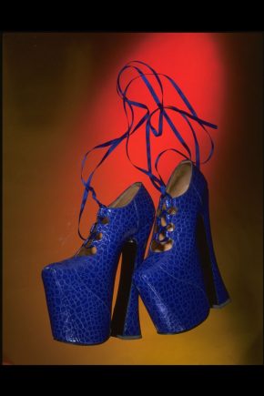 T.225:1-1993; T.225:2-1993 Pair of bright blue punched leather Mock-Croc platform shoes, blue silk ribbon laces, platform soles by Vivienne Westwood (b.1941); U.K. (London); from the Autumn/ Winter 1993 - 94 Anglomania Collection.