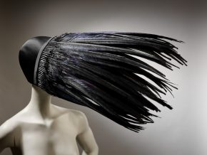 Kiss of Death Bonnet: Black satin bonnet with pheasant feathers, designed by Jo Gordon, Britain, 1994. Museum number: T.139-1996.