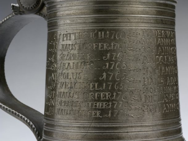 9086-1863 Tankard Pewter Guild tankard with inscriptions and lid with shield and lion figure. German, 1704. Joseph Dor Germany 1704 Pewter with engraved inscriptions.