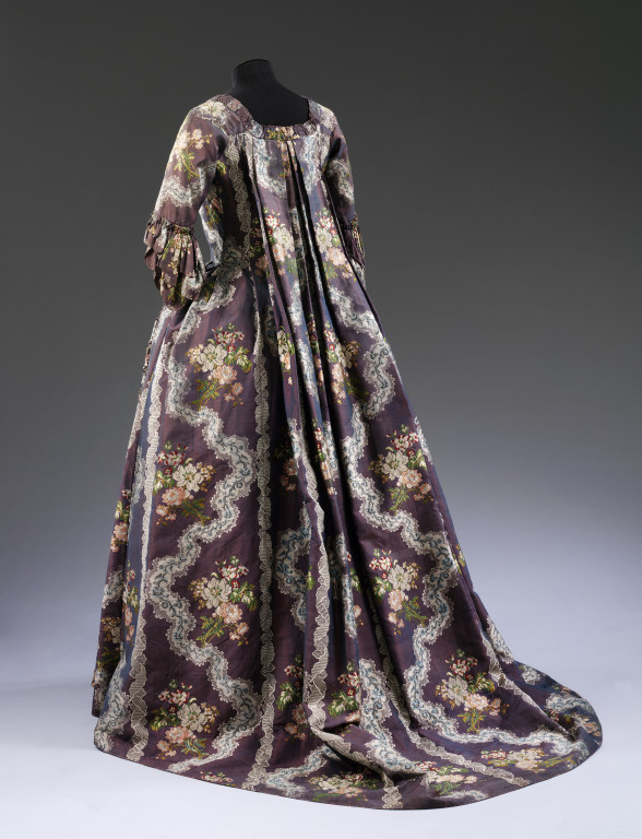 Sack back gown, purple silk, brocaded with flowers and lace, French, 1765-1770. V&A T.708-1913 
