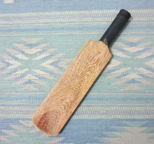 Wooden bat used in preparation of fabric © RedTree Textile Studio