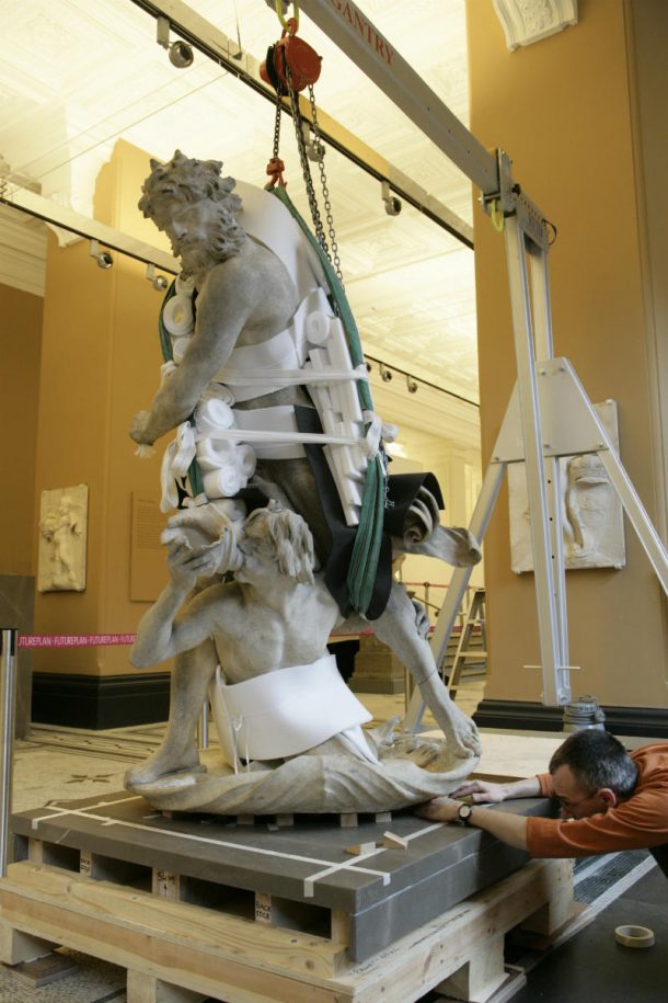 Phil James, technician installing Neptune and Triton in the Dorothy and Michael Hintze Gallery in 2006 © Victoria and Albert Museum, London
