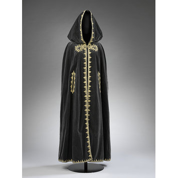 Black velvet cape with metal thread and silk embroidery, designed by Naima Bennis, c. 1970. V&A: ME.4-2015