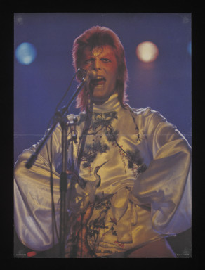 Colour print poster depicting David Bowie during his Ziggy Stardust period, 1974 (V&A S.3679-1995)