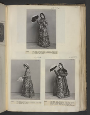 Model (or staff member) wearing items Day Dress & Cloak, English c.1842