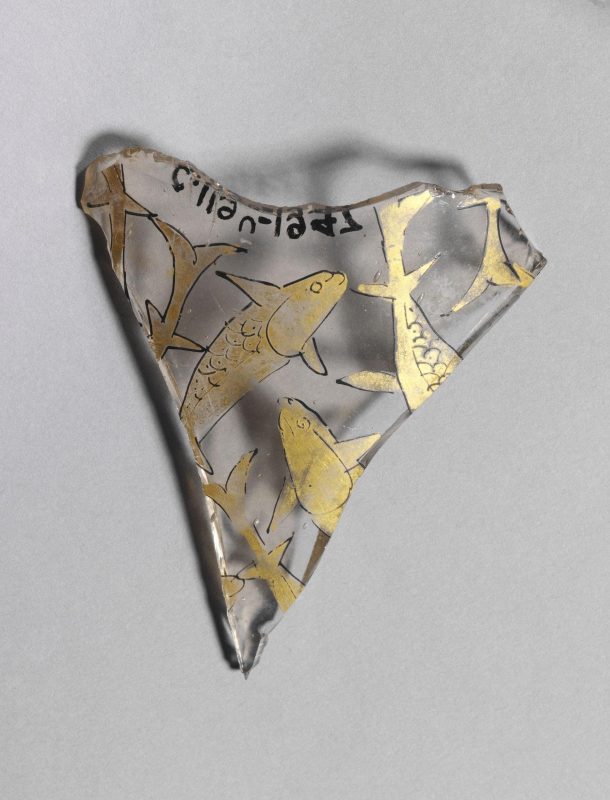 A triangular shard from a glass beaker.