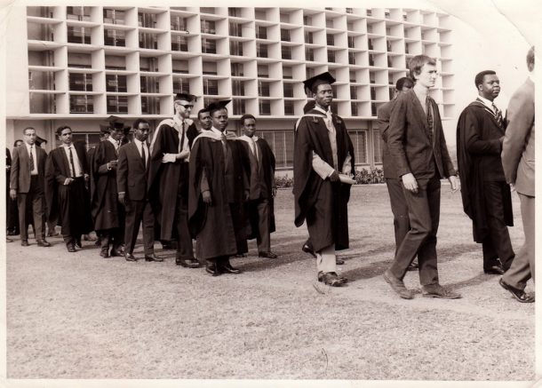 A procession of people at a university