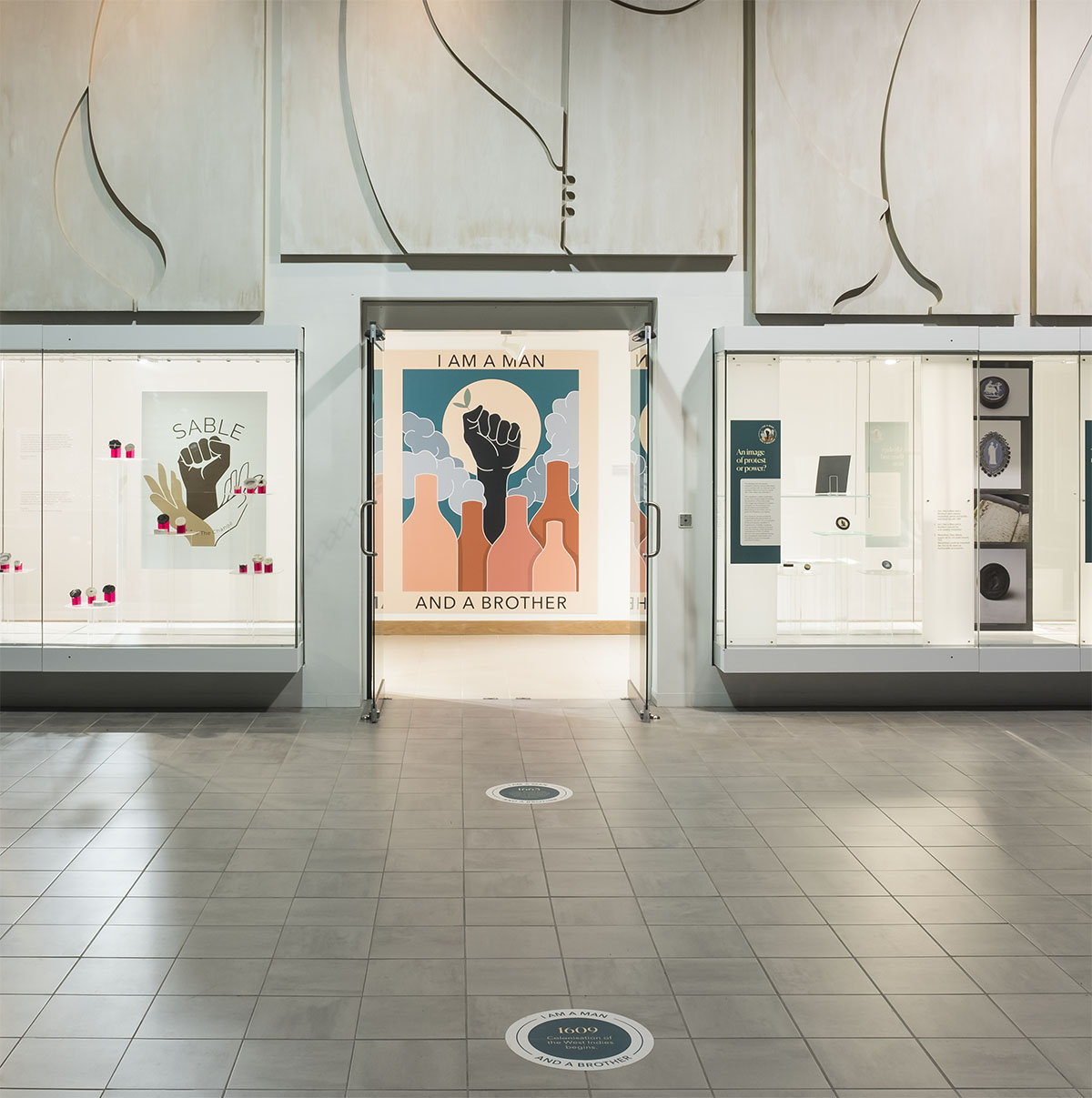 A gallery space at the V&A Wedgwood Collection showing the I am a Man and a Brother display