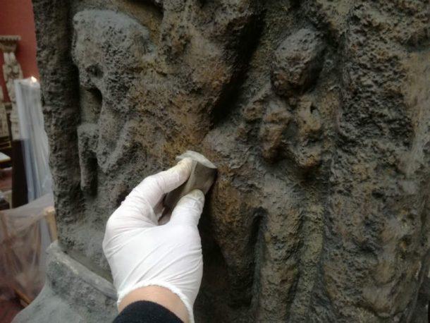 Cleaning the top of the Monasterboice Cross. Image, Johanna Puisto © Victoria and Albert Museum, London.