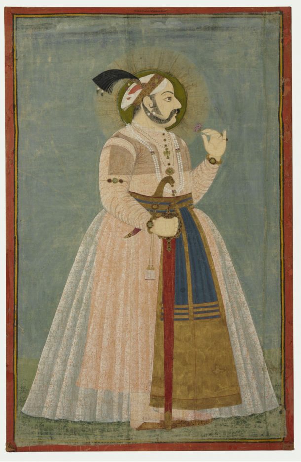 A man holding a flower and looking in profile to the right. His right hand holds a sword in a scabbard.