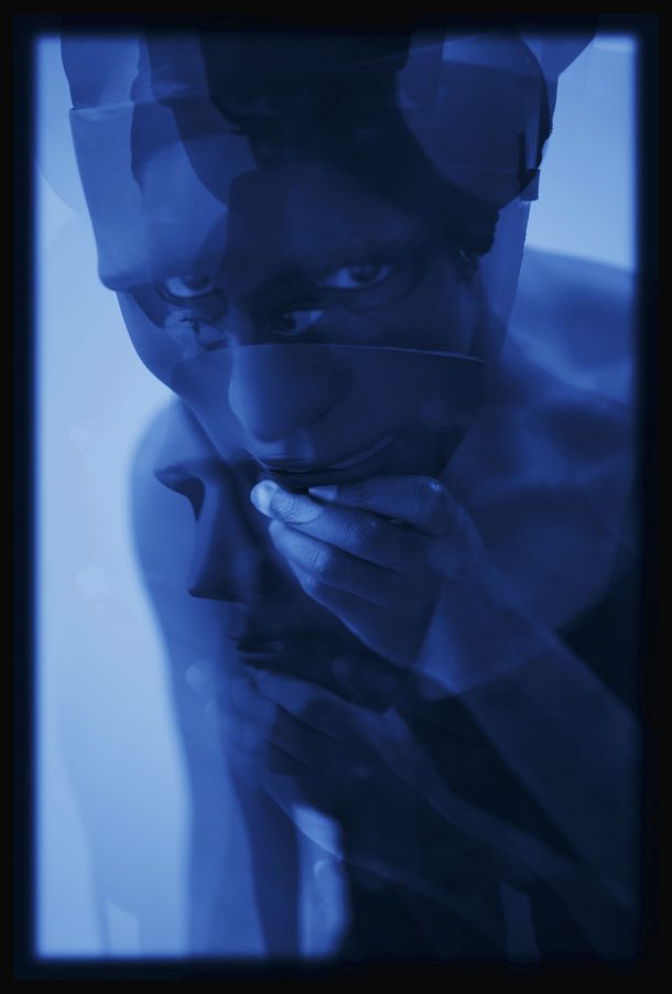 Two overlayed-images of people with a blue tint