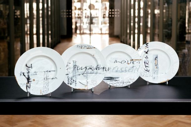 Four plates arranged on display