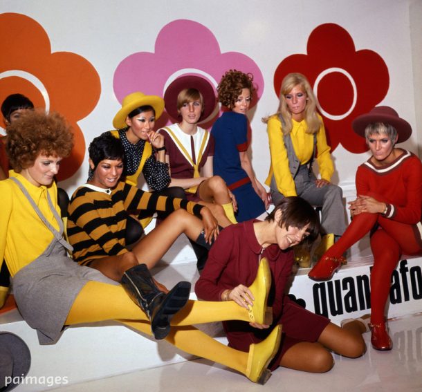 August 1967: Mary Quant (foreground) with models showing her new shoe creations in London.