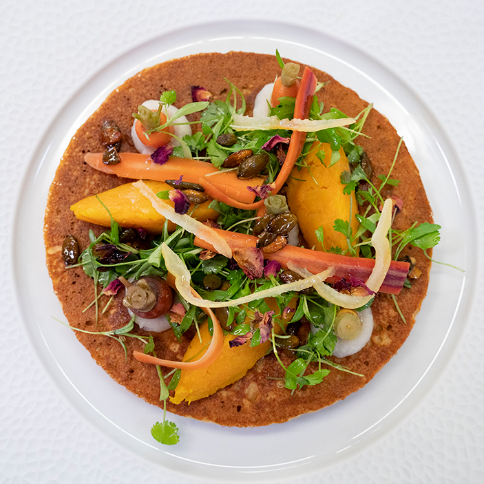 Savoury, spiced chickpea crumpet with fermented carrots