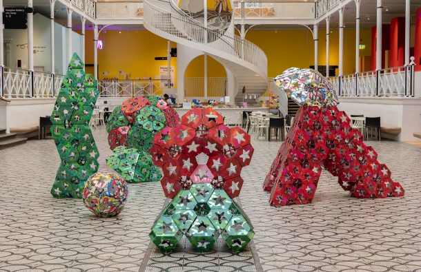 A series of cardboard sculptures in the market hall space at Young V&A