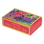 A soap bar paper box decorated with a colourful abstract artwork on the top and bright pink edges. 