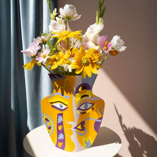 Orange abstract face paper vase