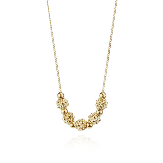 Ornate gold bead necklace by Mounir